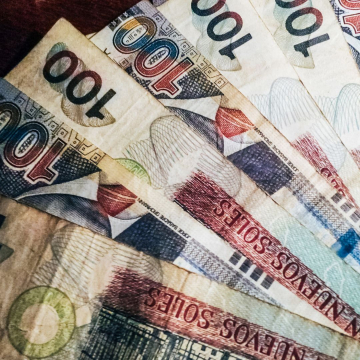What is the official currency of Peru? 
